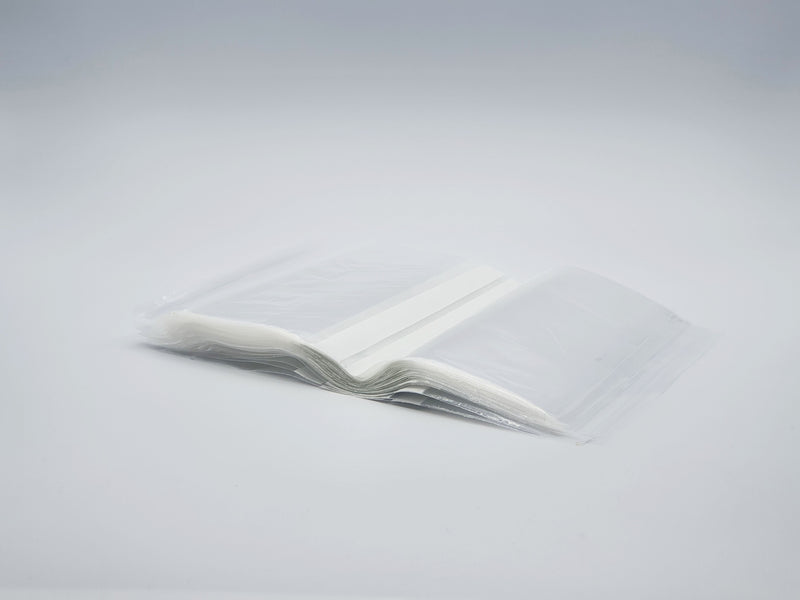 Self seal bags with write on panels